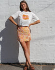 the famous summer grooves print. Sustainable and ethical groovy printed mini skirt.